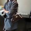 Estilo Coreano Nicho Versátil Portátil Bolso Concha de Mujer 2025 Nueva Moda Simple Para Ir al Trabajo Estilo Occidental Un Hombro Axilar