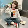 Camiseta de manga larga a rayas de algodón puro para niña, nuevo estilo primavera y otoño 2026, holgada y elegante, camiseta básica versátil para niños