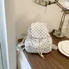 Mochila de moda con diseño único de lunares 2026 nuevo modelo mochila de gran capacidad para la escuela y para ir al trabajo para mujer versión coreana bolsa para estudiantes
