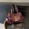 Bolso Grande de Alta Gama Transfronterizo para Mujer Estilo Coreano Nicho Motocicleta Remache Bolso Tote de Hombro Versátil a la Moda