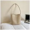 Bolso Cubo de Verano Más Vendido para Mujer, Bolso de Playa Calado, Bolso Tejido, Bolso de Nicho para Madre e Hija, Bolso de Hombro para Vacaciones en la Costa al por Mayor