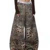 Jeans de Primavera 2026 Nuevos Estilo Retro Americano Parcheados Estampado de Leopardo Lavado Diseño Desconstruido Pantalones de Pierna Ancha Curvos Unisex