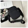 2025 Moda Versátil Estilo Ocidental Masculino e Feminino Estilo Coreano Bolsa de Ombro Transversal Bolsa Quadrada Pequena de Lona Bolsa Pequena Simples Estilo Coreano