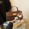 Nova Moda Outono e Inverno 2026 Estilo Simples Bolsa de Axila Versátil Bolsa de Ombro Bolsa Baguete de Nicho Bolsa de Mão