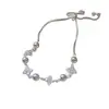 Pulsera de Perla con Trébol de Cuatro Hojas de Circonia Plateada para Mujer, Sencilla, Lujo Ligero, de Nicho, Exquisita, de Gama Alta, Elegante Joyería de Mano