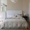 Elegante Luxo Leve 60s Lyocell Tencel Lavado à Areia Toque Vintage Bordado para Dormir Nu Conjunto de Cama de Quatro Peças Coração de Menina