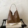 Bolsas de mano pequeñas vintage estilo coreano al por mayor para mujer, nuevo modelo otoño 2026, bolso de hombro patchwork de color liso, bolso para axila madre-hija