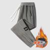 Pantalones deportivos de pana con forro polar de invierno para hombre, nuevos pantalones de chándal de moda negros que combinan con todo, de color sólido, con forro polar y cálidos.