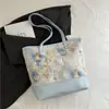 Bolsa Tote Escolar para Mulheres 2026 Novo Estilo Ombro Único Floral Grande Capacidade para o Dia a Dia Casual Bolsa Tote Atacado