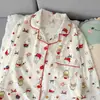 Estampado integral de conejito con borde rojo estampado integral de dibujos animados conjunto de pijama de manga larga y pantalón largo ropa de casa de alto valor primavera y otoño