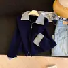 Cardigan de Tricô Patchwork Jeans Longo com Gola Lapela Estilo Coreano Solto Casual Novo Outono/Inverno 2026 para Mulheres, Elegante e Emagrecedor Tendência