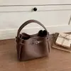 Bolso cubo retro de nicho estilo coreano transfronterizo para mujer, nuevo bolso de hombro versátil casual 2026, bolso de mano, bolso cruzado