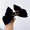 Horquilla de lazo estilo Chanel Hepburn francés pequeño para mujer, clip de resorte para la parte posterior de la cabeza, sentido de celebridad de Internet, clip para otoño e invierno, tocado