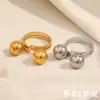 Anel/Pulseira Tendência Estilo Ins Europeu e Americano Cruzado Simples e Versátil Personalizado Anel de Bola Dupla em Aço Inoxidável Banhado a Ouro 18K para Mulheres