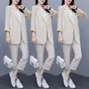 Conjunto de blazer de dos piezas con botones y bolsillo transfronterizo para mujer, moda de primavera y otoño, corte holgado, elegante y moderno