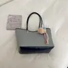 Bolso de mujer grande, moderno y sencillo, modelo nuevo 2026, bolso de hombro para el trabajo, bolso de mano de alta gama, bolso tote, bolso tipo cubo