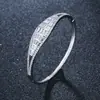 Conjunto de anillo y pulsera de latón chapado en oro con circonita microincrustada, moda europea y americana de moda transfronteriza, outlet de fábrica