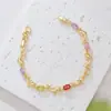 Pulsera bestseller transfronteriza temática del océano con delfín empalmado y circonita colorida, con diseño de cierre chapado en oro, pulsera dulce popular