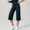 Calça pantalona cropped de alta elasticidade transfronteiriça, com sensação de pele nua, novo conjunto esportivo popular de duas peças com manga curta, calça cropped para yoga