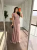 Vestido largo estilo francés de cuello en V europeo y americano 2026, sin mangas, entallado en la cintura, vestido de lujo ligero, nuevo vestido de noche