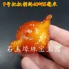 Cera de abeja al por mayor fluorescente flotante agua salada mango de cera de abeja colgante Hu cera de abeja color amarillo aceite de pollo colgante Buda Guanyin cabello de cera de abeja vieja