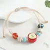Popular Pulseira de Cerâmica Transfronteiriça Enfeites de Natal Maçã Concha Pulseira de Contas Estilo Floresta Versátil de Nicho Pulseira de Estudante
