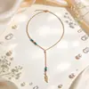 Collar Versátil en Forma de Y con Cuentas de Turquesa Bohemio Europeo para Mujer Colgante de Pluma Retro Personalizado Collar Largo