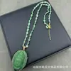 Otoño e invierno nuevo colgante de Guanyin Bodhisattva esmaltado incrustado collar estilo nacional cadena de suéter retro suministro