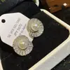 Pendientes Retro de Espiral con Hoja de Loto y Perla Estilo Francés, Elegantes y Versátiles para el Trabajo, Pendientes de Lujo Ligero y Nicho de Alta Gama para Mujer