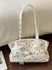 Bolsa de mano estilo coreano con estrellas y puntos transfronteriza, nuevo modelo 2026, bolso de hombro simple de gran capacidad, bolso de moda para el trabajo bajo el brazo