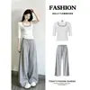 Conjunto de camisola gris de cuello halter y pantalones casuales para mujer en otoño, único, deslumbrante y hermoso, perfecto para usar en verano