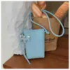 Moderna bolsa pequeña cruzada para mujer 2026 nueva de moda verano elegante versátil bolsa para teléfono versión coreana bolsa de hombro cruzada