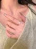 Anillo abierto de camelia para mujer, diseño de nicho ajustable, moderno, personalizado, ligero, de lujo, de alta gama, con circonita cúbica.