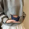 Mini Bolsas Pequeñas Transfronterizas para Mujer 2025 Nuevo Modelo Bolsa para Labial Auriculares Bolsa Tipo Dumpling Estilo Coreano Cartera Personalizada Al por Mayor