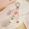 Novo estilo japonês e coreano gatinho comendo peixe fofo flocado estrela de cinco pontas pata de gato coração chaveiro goo este pingente de mochila de corrente