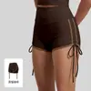 Nuevo conjunto de yoga con top de tirantes finos, pantalones capri de alta intensidad, conjunto deportivo para correr de ajuste ceñido con cordón y bloques de color