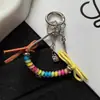 Cadena de hueso de serpiente de cable telefónico nueva y creativa con lazo personalizado, decoración versátil para bolso y accesorio para funda de teléfono