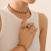 Conjunto de pendientes, collar y pulsera de circonitas de color con diseño de nicho, de acero de titanio transfronterizo, resistente a la decoloración, joyería al por mayor.