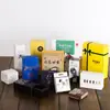 Venta al por mayor de fábrica caja de cartón plegable cuerpo de caja de cosméticos pistola de temperatura máscara caja de embalaje de alimentos caja de pastillas de té perfumado empaque de color