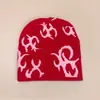 Nuevo patrón gorro de punto estilo europeo y americano de nicho para hombres y mujeres cálido personalidad hip-hop rap gorro pullover para exteriores venta al por mayor