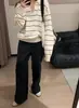 Suéter de punto con cuello polo a rayas blancas y negras, estilo minimalista coreano, nueva colección otoño 2026, top versátil de alta gama