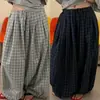 Calça pantalona xadrez unissex estilo retrô americano com caimento relaxado e casual, calça tipo lanterna de modelagem solta com barra ajustada