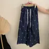 Top de Manga Corta de Verano para Niñas Estilo Coreano con Estampado de Letras Versátil Lazo Casual Pantalón Deportivo Conjunto de Dos Piezas de Moda para Niños