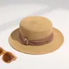 Sombrero de paja natural tejido de ala plana estilo francés para mujer, vacaciones de verano en la playa, nuevo modelo 2026, circunferencia de cabeza grande, sombrero de paja para protección solar