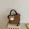 Bolsa Feminina Transfronteiriça 2026 Nova Desenho Animado Fofo Super Quente Ursinho Bolsa de Mão Sensação de Alto Padrão Estilo Acadêmico Menina Bolsa de Ombro