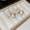 Pendientes de plata con forma de mariposa y flor de perla retro francesa, pequeños y exquisitos, de alta gama, con diseño de hada súper dulce para mujer.