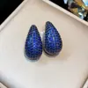 Pendientes de botón de plata con baño de oro real de 18 quilates, con aguja de plata, circonita y diseño único de oreja de gato, de lujo ligero y sensación de alta gama, al por mayor