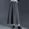 Falda de línea A moderna y sencilla para mujer, nueva falda larga adelgazante de cintura alta para otoño e invierno 2026 con corte holgado y caída y dobladillo ancho