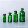 Botella de aceite esencial Boston 30ml60ml botella con gotero botella pulverizadora Botella para loción botella verde a prueba de luz sub-botella cosmética