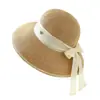 Sombrero de paja de ala ancha con elegante lazo estilo Hepburn para vacaciones de verano en la playa, protección solar y sombrero de pescador para estilizar el rostro